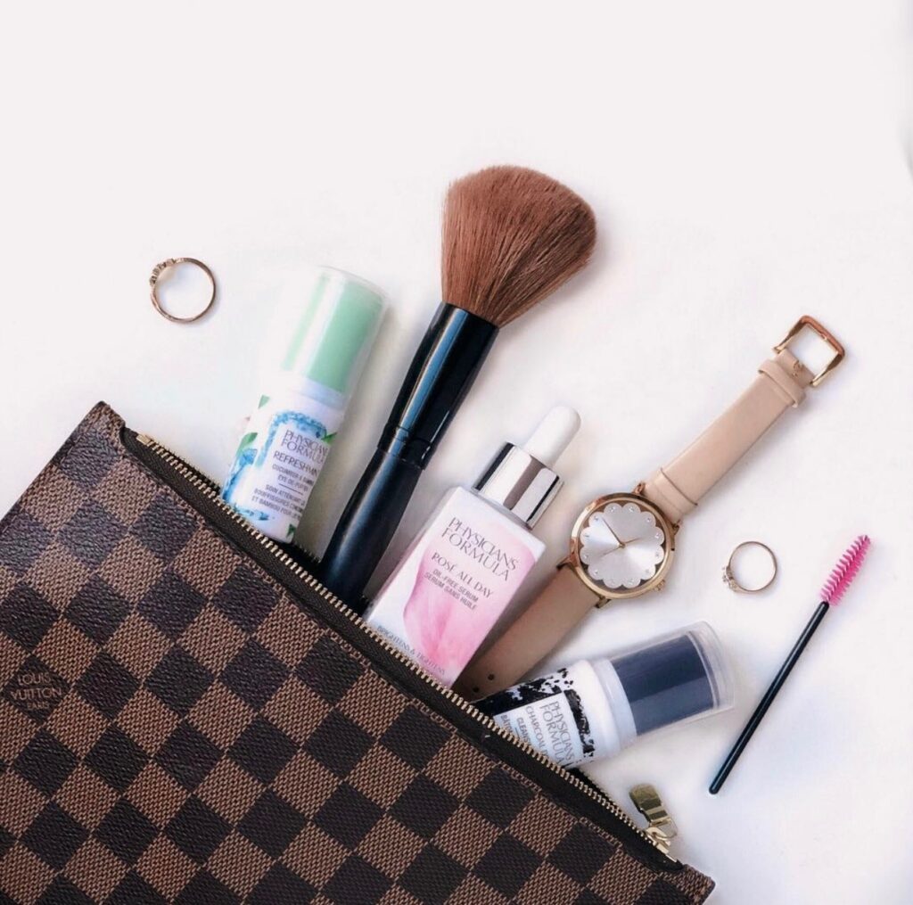 Beauty products are coming out of a toiletry bag